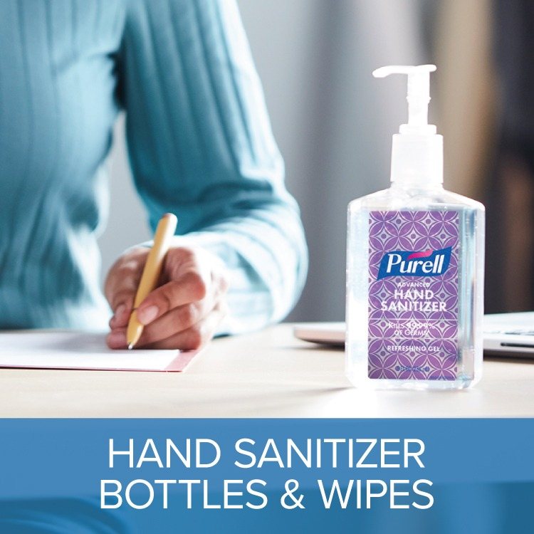 PURELL Advanced hand sanitizer pump bottle on a desk next to a notebook